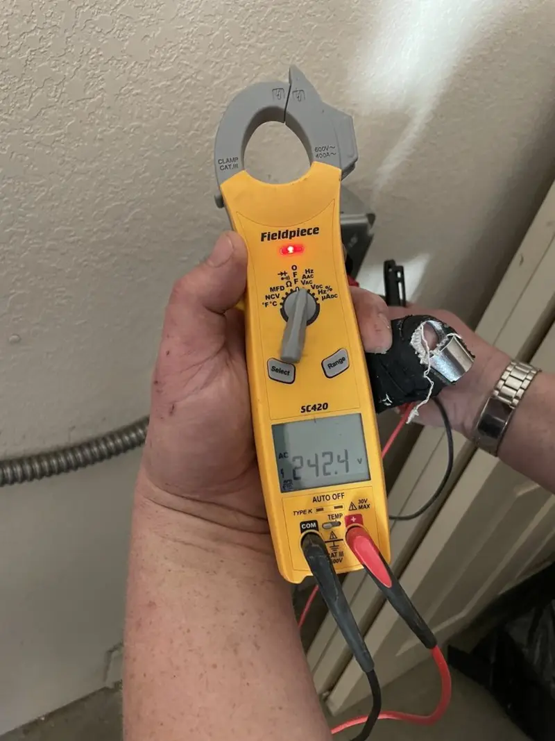 Voltage testing with clamp meter during Hot Tub / Pool Electrical Wiring in Duncan